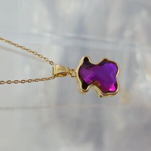 Gold Pendant Necklace with Purple Gemstone